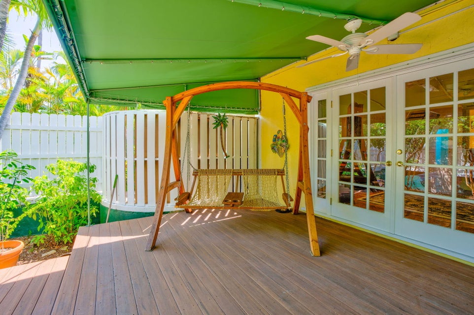 Spacious outdoor living deck and fenced yard at 3365 Flagler Avenue townhome in Key West